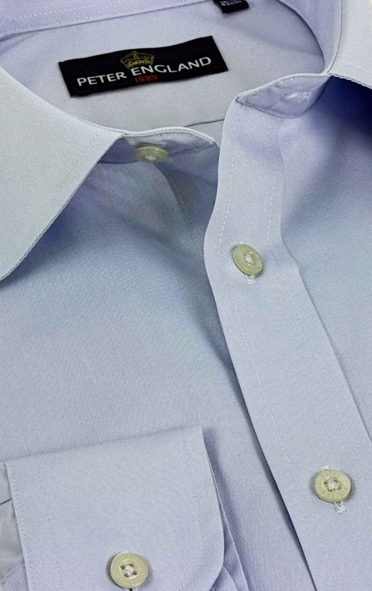 Peter England extra long sleeve men’s shirt with added body and sleeve length, chest pocket, and branded buttons – tailored for taller builds.